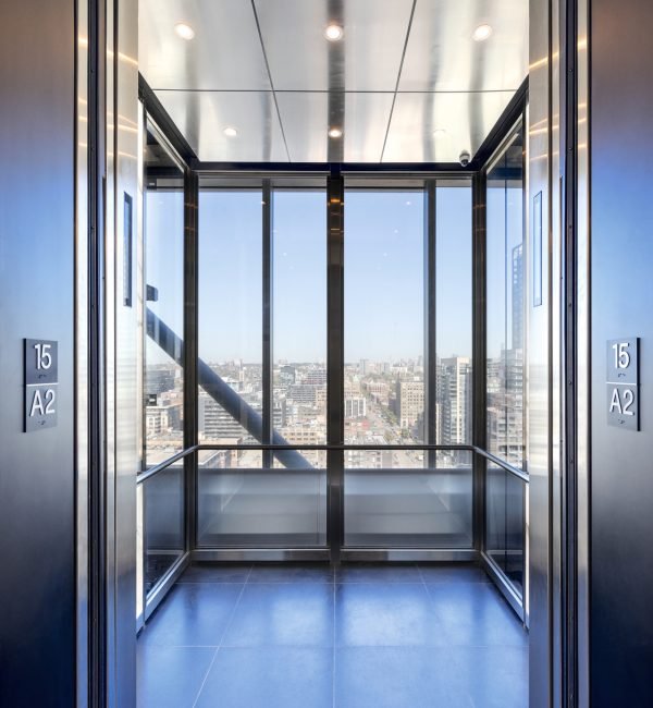 A Schindler elevator with glass walls